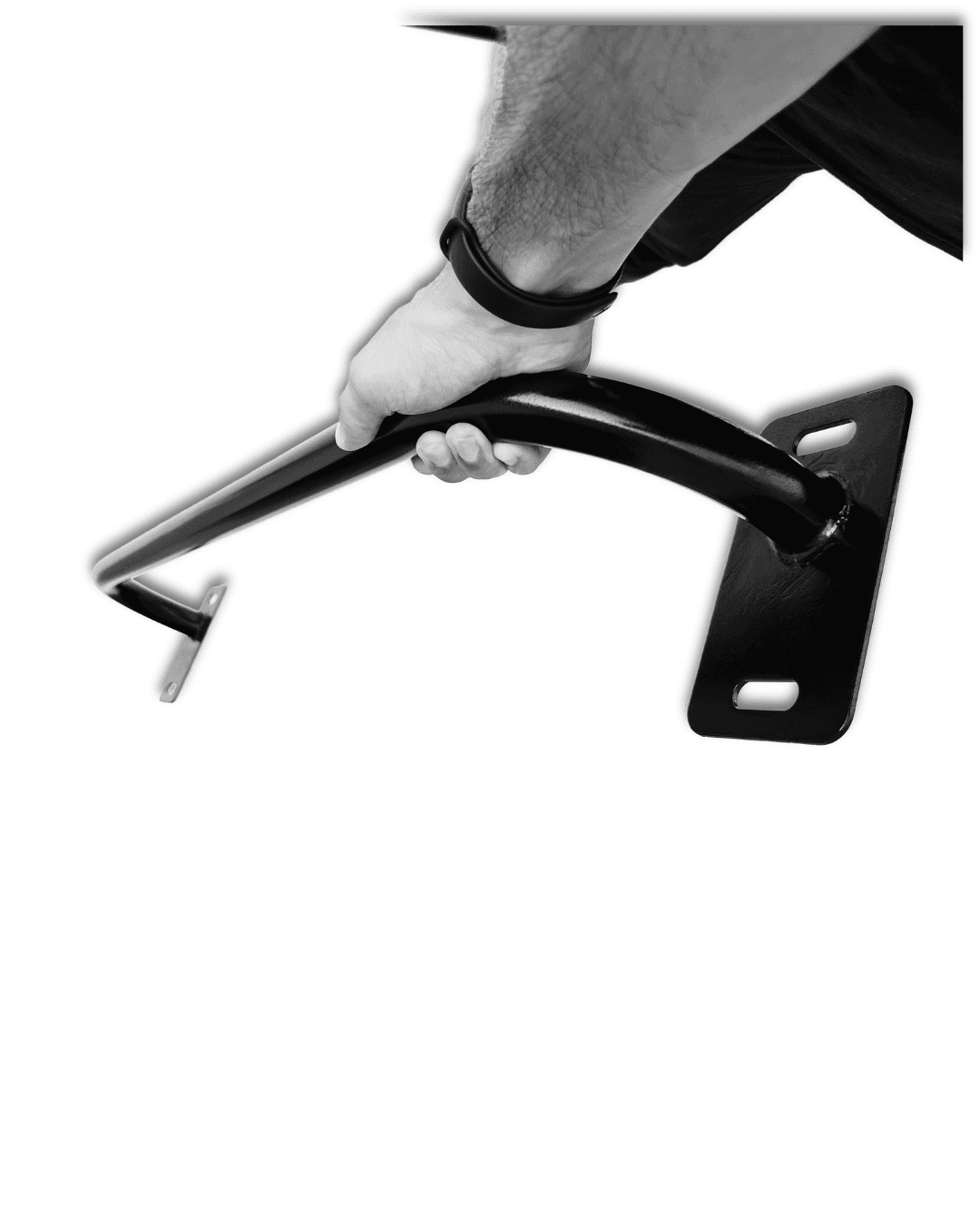 Athlete gripping a wall-mounted pull-up bar
